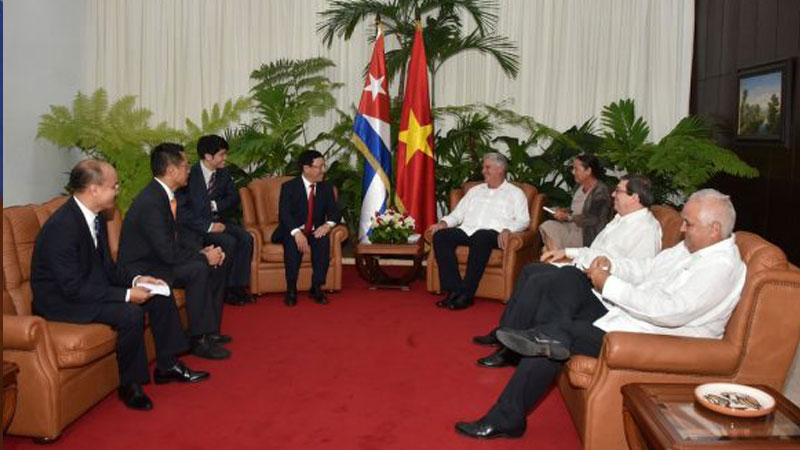The Cuban President Miguel Diaz Canel and Pham Binh Minh