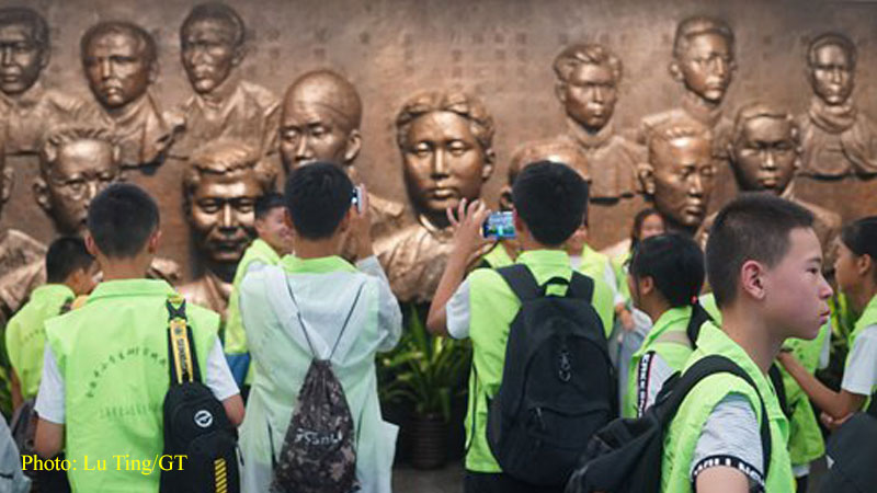 Students visit the museum of the First National Congress of the Communist Party of China on Thursday. Photo: Lu Ting/GT