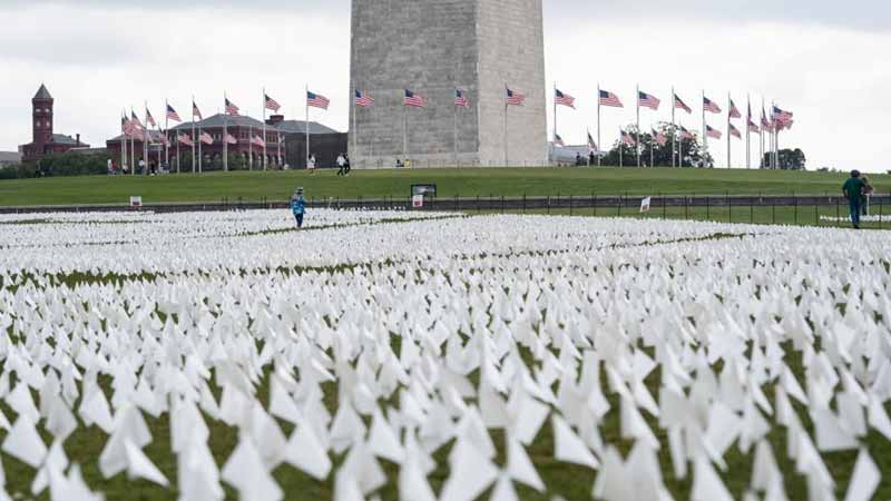 White flags are seen on the National Mall in Washington, D.C., the United States, on Sept. 16, 2021. More than 660,000 white flags were installed here to honor the lives lost to COVID-19 in the United States.Photo:Xinhua