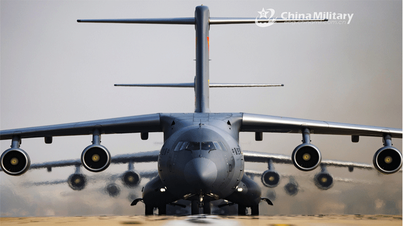 Y-20 transport aircraft participate in a close formation taxi known as elephant walk on the runway. Photo:China Military