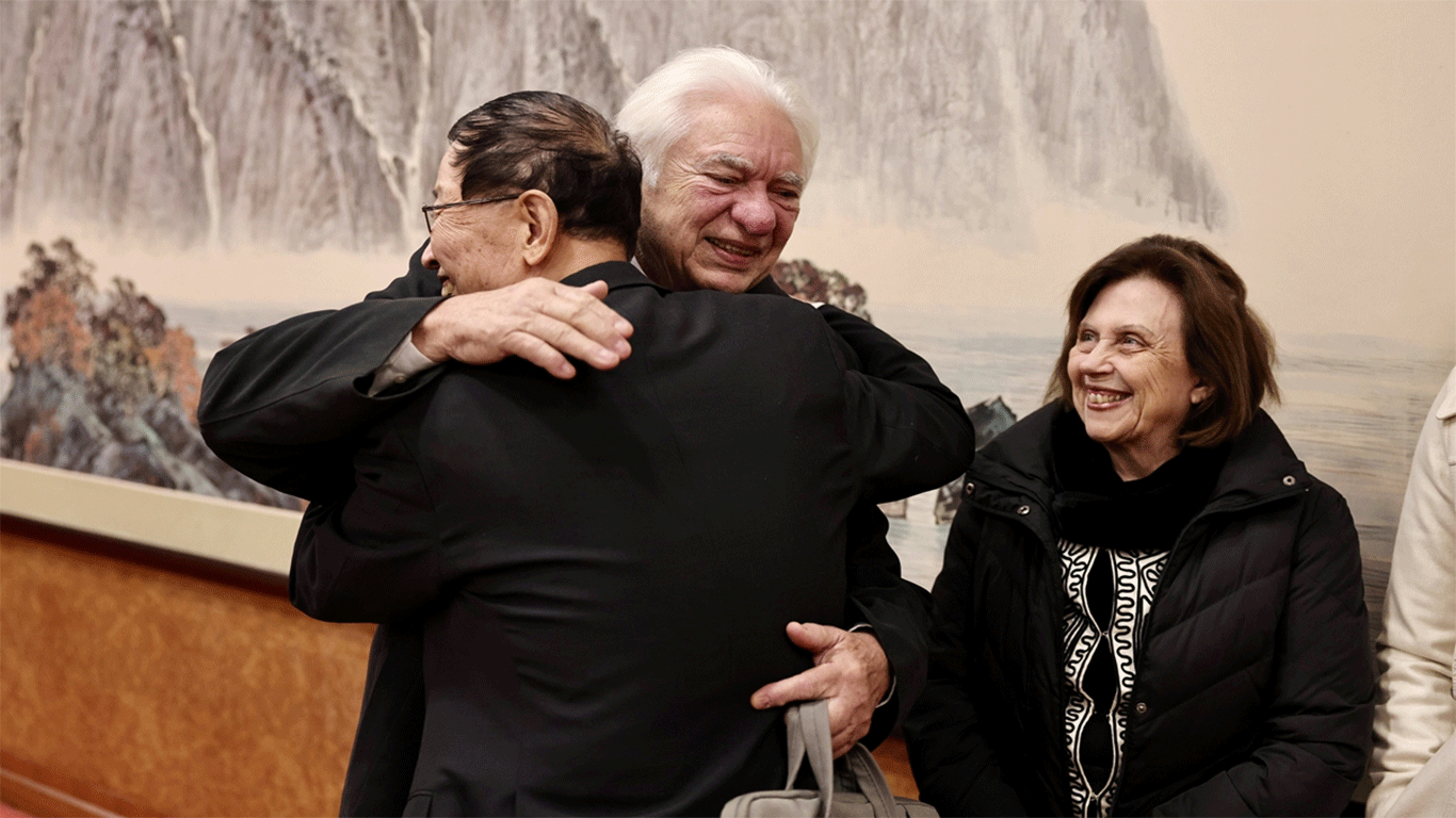 Jose Raimundo Coelho, ex-president of the Brazilian Space Agency (center) embraces Ma Shijun, CBERS project mission manager of the Chinese side, in Beijing on February 5, 2024. Photo: Deng Xiaoci/GT