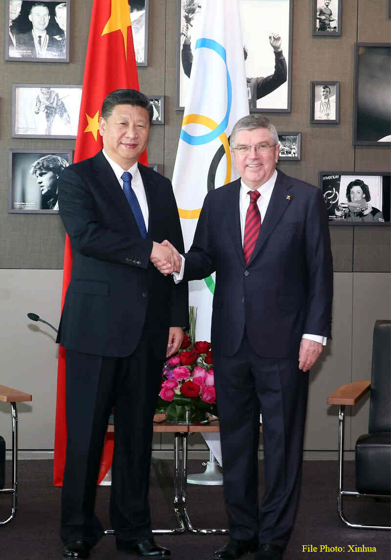 Chinese President Xi Jinping meets with IOC President Thomas Bach on January 18, 2017 in Lausanne, Switzerland. Photo: Xinhua